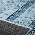 dywan-vintage-armand-niebieski-zblizenie-runa-i-spodu-dywanu.webp