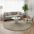 dywan-nowoczesny-art-3d-bezowy-w-aranzacji-w-salonie-na-jasnej-podlodze-z-jasna-sofa-bialym-stolikiem-i-fotelem.png