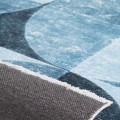 dywan-nowoczesny-dean-niebieski-zblizenie-spodu-dywanu-i-wykonczenia-boku.webp