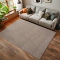 dywan-nowoczesny-helix-aranzacja-na-ciemnej-podlodze-z-sofa.jpg