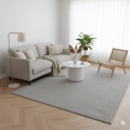 dywan-nowoczesny-helix-jednobarwny-szary-aranzacja-w-salonie-na-jasnej-podlodze-z-jasna-sofa-stolikiem-kawowym-krzeslem-z-duzym-oknemjpg.png