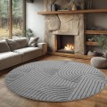 dywan-nowoczesny-3d-helix-geometria-szary-kolo-aranzacja-w-salonie-z-jasna-sofa-i-kominkiem.jpg
