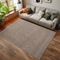 dywan-nowoczesny-3d-helix-boho-bezowy-aranzacja-w-salonie-z-biala-sofa-na-ciemnej-podlodze.jpg
