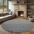 dywan-nowoczesny-3d-helix-boho-szary-aranzacja-w-salonie-z-sofa-i-kominkiem-na-ciemnej-podlodze-z-oknem-w-tle (2).jpg