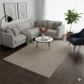 dywan-nowoczesny-art-3d-geometria-bezowy-aranzacja-w-salonie-z-wygodnym-fotelem-i-duzym-oknem-w-tle-i-jasna--sofa-na-ciemnej-podlodze.jpg