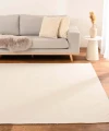 Dywan-Zaran-kośc słoniowa-100%-bawełna-pure-cotton-ręcznie-tkany-zbliżenie-aranżacja-w-salonie.jpg