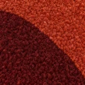 Dywan_wełniany_Dune_Teracotta_Kolo_fragment_wzoru_kolorystyka.jpg